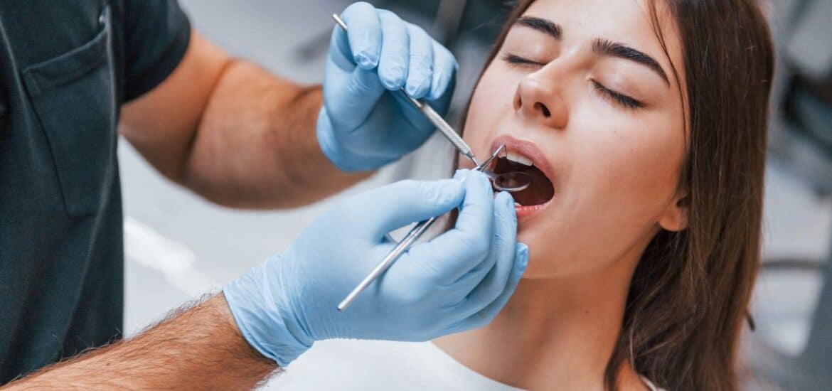 Patient receiving cosmetic dental treatment.