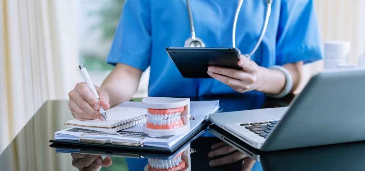 Dentist creating a comprehensive treatment plan.