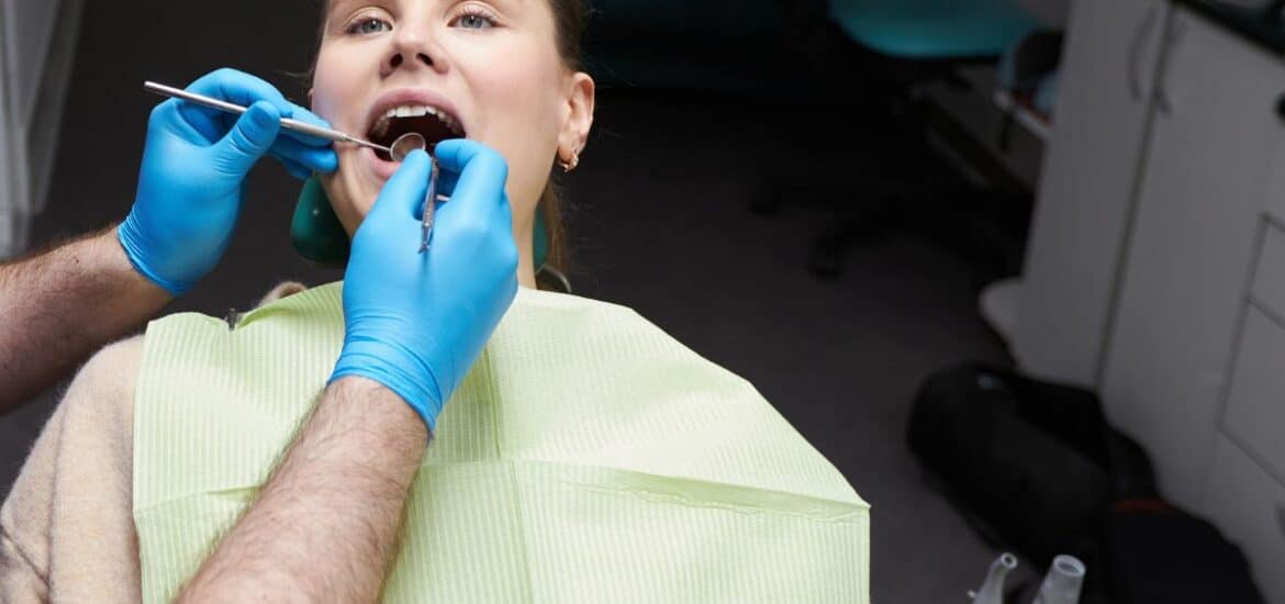 Patient receiving comprehensive cosmetic and dental care focused on facial harmony and smile enhancement at a modern clinic.